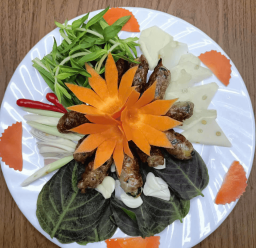 CHẢ ỐC CUỘN MỠ CHÀI